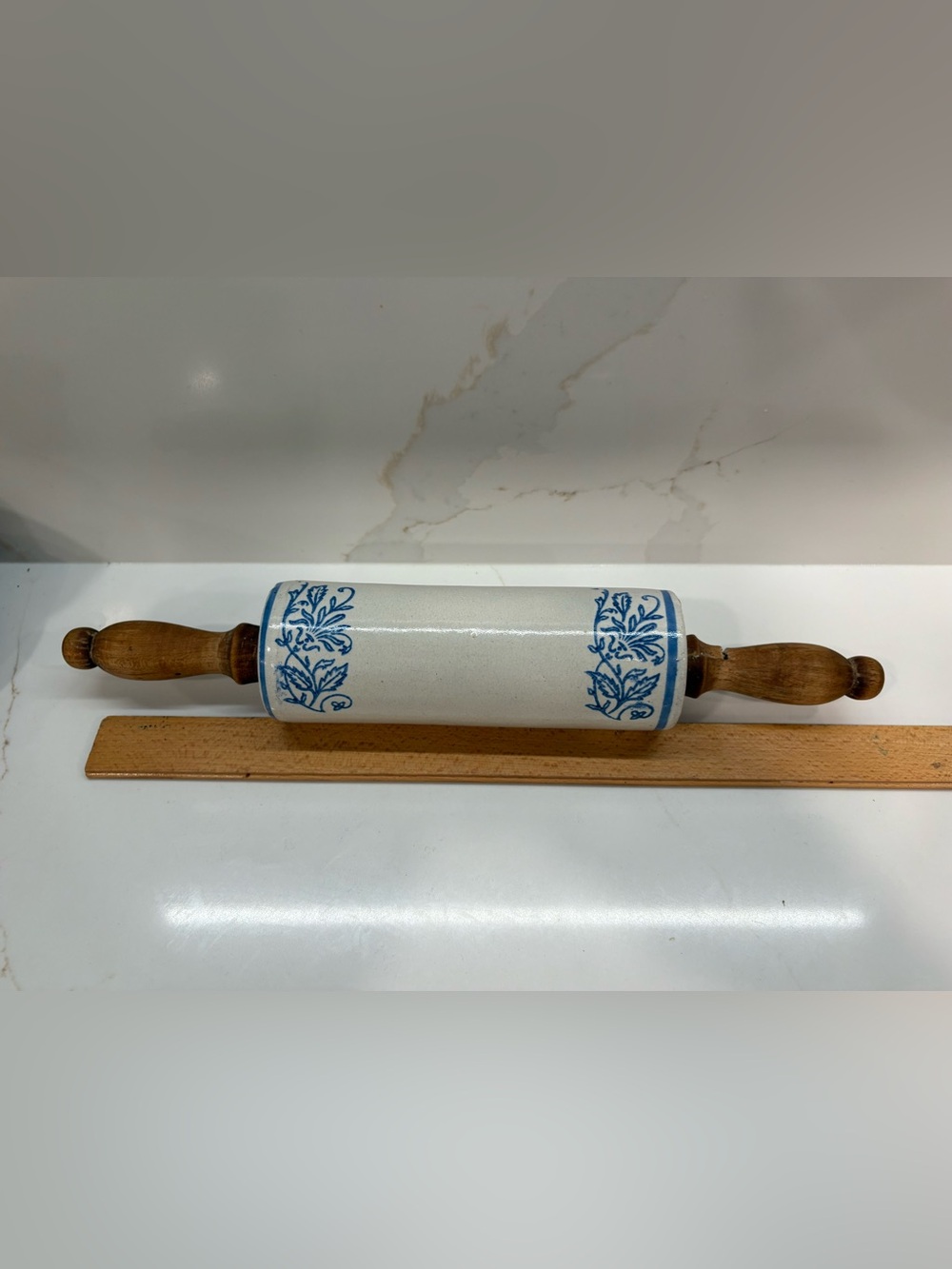 Vintage Blue and White Floral Ceramic Rolling Pin with Wooden Handles.